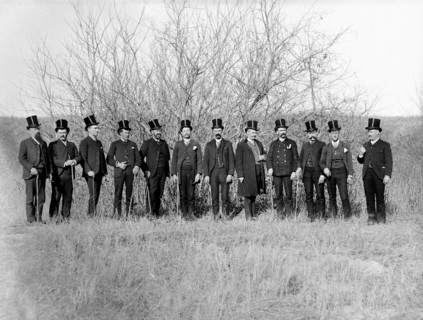 Group of  Democrats in Black Silk Plug Hats during Grover Cleveland Presidential Campaign, Full-Length Portrait, Mason City, Nebraska  USA, Photograph by Solomon D. Butcher, 1888