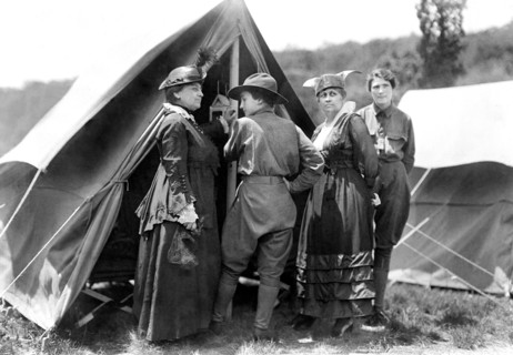 Mary Dimmick Harrison, wife of President Benjamin Harrison and her daughter Elizabeth Harrison Walker with Mrs. Green and probably her daughter, Helen standing at tent of Emergency Services Corps camp...