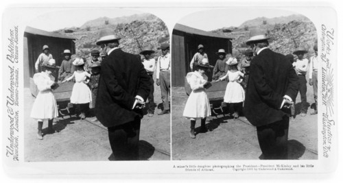 A Miner's Daughter Photographing the President--President McKinley and his little friends of Arizona, Stereo Card, Underwood & Underwood, 1901
