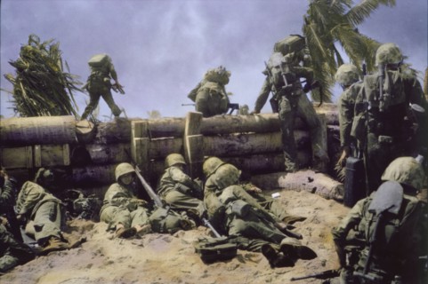 U.S. Marines Climbing over Coconut Log Seawall during Battle of Tarawa, Tarawa Atoll, Gilbert Islands, November 1943