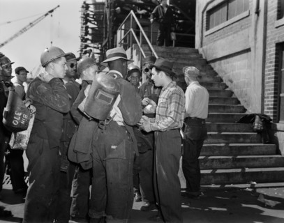 Group of Construction Workers engaged in Building Liberty Ship Frederick Douglass, Bethlehem-Fairfield Shipyards, Baltimore, Maryland, USA, Roger Smith, U.S. Office of War Information, May 1943