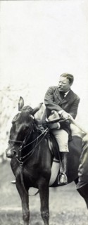 U.S. President Theodore Roosevelt on Horseback Shaking Hands with Unidentified Person, Washington, D.C., USA, Photograph by Barnett McFee Clinedinst, June 22, 1908