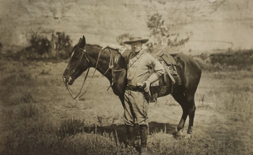 Full-Length Portrait of Theodore Roosevelt Standing Alongside Horse, Wearing Cowboy Outfit, Photograph by T.W. Ingersoll, 1910