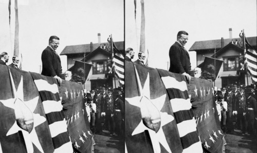 U.S. President Theodore Roosevelt on Flag-Draped Platform, smiling to crowd during Speech, Brattleboro, Vermont, USA, September 1, 1902