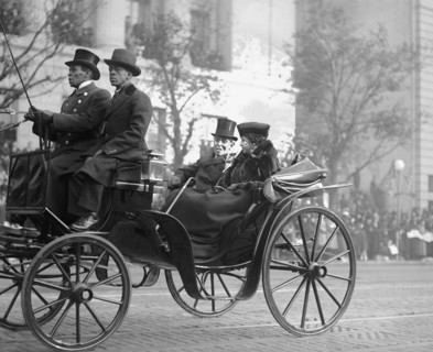 Former U.S President Woodrow Wilson and his Wife Edith Bolling Wilson Riding in Horse-drawn Carriage to Burial of Unknown Soldier, Armistice Day, Photograph by National Photo Company, November 11, 192...