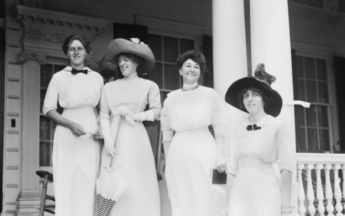 Jessie Wilson, Margaret Wilson, Mrs. Woodrow Wilson, Eleanor Randolph Wilson, Half-length Portrait Standing on Porch Steps of Summer Residence, Sea Girt, New Jersey, USA, Bain News Service, July 1912