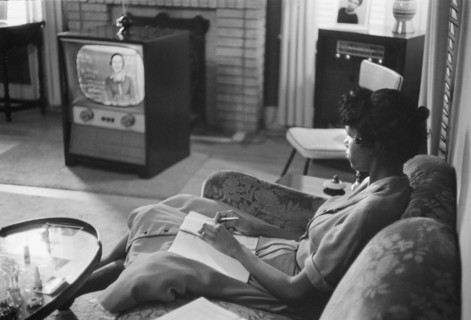 African-American High School Girl being Educated via Television during period that Schools were Closed to Avoid Integration, Little Rock, Arkansas, USA, photograph by Thomas J. O'Halloran, September 1...
