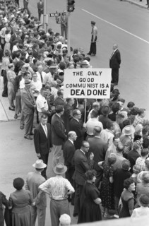 Crowd gathered on Street to see Soviet Leader Nikita Khrushchev, Man holding Sign "The only Good Communist is a Dead Communist", Des Moines, Iowa, USA, photograph by Thomas J. O'Halloran, September 19...