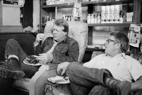Democratic U.S. Presidential Nominee Jimmy Carter eats with his brother, Billy Carter, during a campaign stop at Billy's Gas Station, Plains, Georgia, USA, photograph by Thomas J. O'Halloran, Septembe...