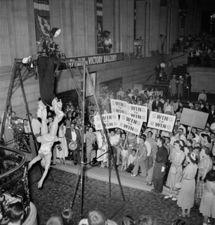 Crowd Watching Acrobat Act while Holding "Swing for Ewing Signs" for Candidate Oscar R. Ewing, Democratic National Convention, International Amphitheatre, Chicago, Illinois, USA, photograph by Thomas ...