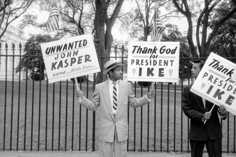 Two Men Protesting John Kasper, an American far-right activist and Ku Klux Klan member who took a militant stand against racial integration during the civil rights movement, Washington, D.C., USA, pho...