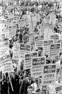 Demonstrators marching in Street holding Signs during March on Washington for Jobs and Freedom, Washington, D.C., USA, photograph by Marion S. Trikosko, August 28, 1963