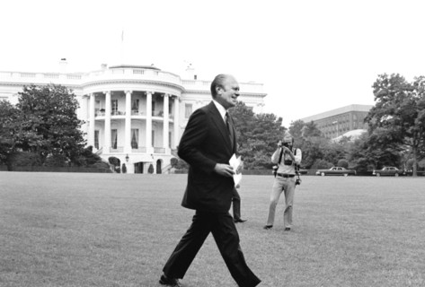 U.S. President Gerald Ford walking across the lawn to a press conference at the White House, Washington, D.C., USA, photograph by Marion S. Trikosko,