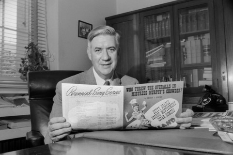 Massachusetts Congressman Thomas P. "Tip" O'Neill, Half-Length Portrait sitting at Office Desk and holding Sheet Music, Washington, D.C., USA, photograph by Thomas J. O'Halloran, August 1957
