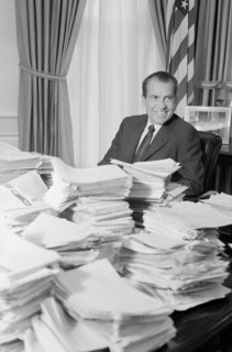 U.S. President Richard Nixon with Stacks of Telegrams after War Speech, White House, Washington, D.C., USA, photograph by Warren K. Leffler, November 4, 1969