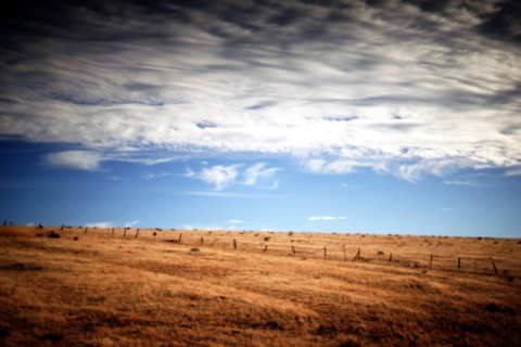 Fenced Rural Landscape with Cloudscape