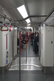 Passengers in Subway Car, Hong Kong, China