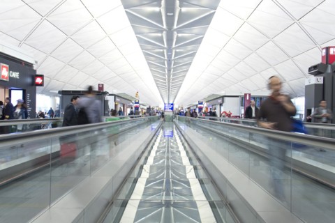 Travelers on Moving Walkway, Chek Lap Kok Airport, Hong Kong, China