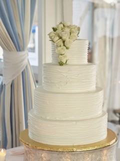 Multi-Tiered Wedding Cake with White Roses