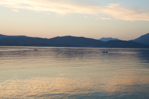 Fishermen at Dusk with Mountainous Landscape in Background, Patras, Greece