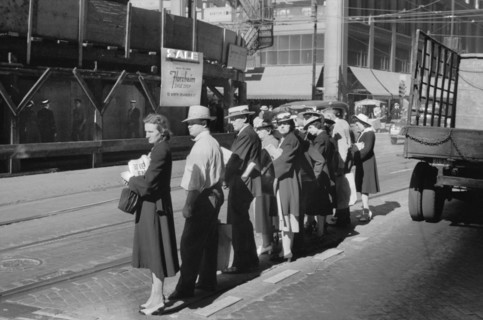 Group of People waiting for Street Car