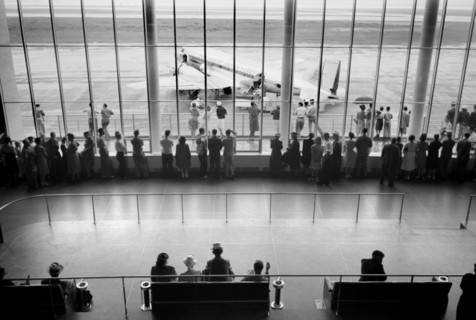 Visitors watching Airplanes from Waiting Area