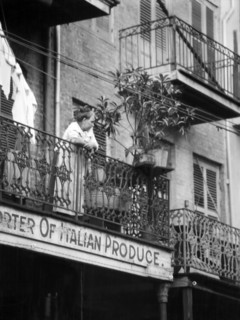 Woman leaning on Balcony