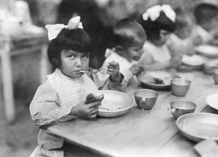 Children eating at one of the Colonies established by Comite Franco-Americain pour la Protection des Enfants de la Frontiere