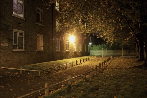 Illuminated Path by Apartment Building