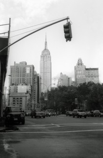 Street View of Empire State Building framed by Traffic Light