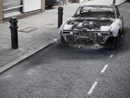 Burnt out Car on Road