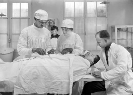 Convalescent American Soldiers lined in front of American Red Cross Bath House waiting their turn