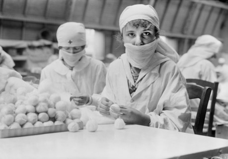 Two French Women making Cotton Balls for the Front Parcel at the American Red Cross Workrooms for Surgical Dressings