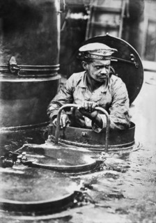 German Sailor coming out of Turret on Torpedo Boat