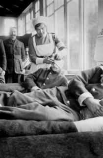 Nurse bandaging Head of Soldier at Canadian Base Hospital during World War I