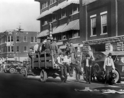 Truck on Street near Litan Hotel carrying Soldiers and African Americans during Race Riots