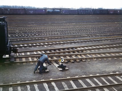 Switchman throwing a switch at Chicago and North Western Railroad's Proviso Yard