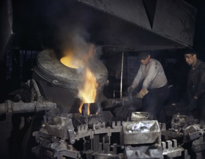 Worker Casting a Billet from an Electric Furnace
