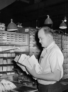 Worker sorting mail at Main Post Office, Washington, 1938
