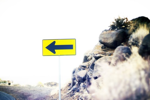 Directional Sign at Edge of Road,,