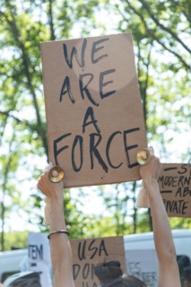 Protester Holding up Sign, "We are a Force" at Black Lives Matter March,