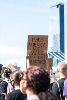 Crowd of Protesters with Signs Marching across Brooklyn Bridge during Juneteenth March, New York City,
