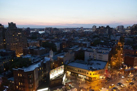 Cityscape at Dusk, Hudson River in Background,