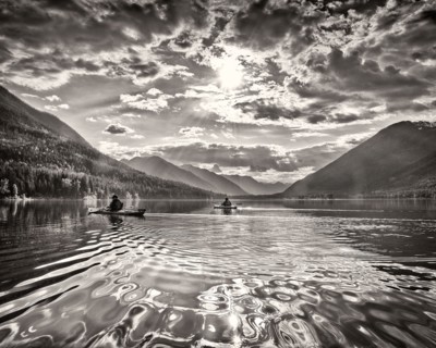 Two Kayakers on Lake with Dramatic Sky,,