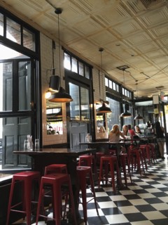 Group of People eating in Restaurant, Daytime,