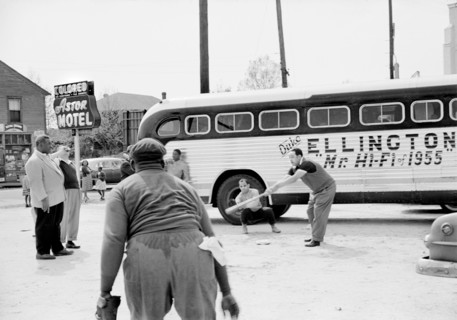 Duke Ellington and Band Members playing Baseball in front of their Segregated Motel while touring, Florida