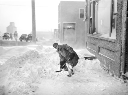 Man Shoveling Snow on Sidewalk, Draper