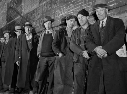 Men waiting in Line outside City Mission, First Twenty-five will be Fed