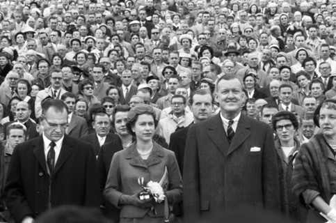 Queen Elizabeth II with Maryland Governor Theodore McKeldin (right) and University of Maryland president Wilson Homer "Bull" Elkins (left), at Maryland Terrapins vs. the North Carolina Tar Heels Footb...