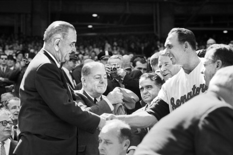 U.S. President Lyndon Johnson shaking hands with Washington Senators Manager Gil Hodges during opening day Game, Washington